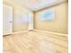 Bedroom features new light wood floors, neutral paint and natural light at 1309 W 10Th St, Tempe, AZ 85281