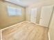 Neutral bedroom with modern wood floors and window with blinds at 1309 W 10Th St, Tempe, AZ 85281