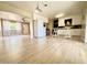 Open kitchen with modern white cabinets, stainless steel appliances, and wood floors at 1309 W 10Th St, Tempe, AZ 85281