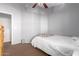 Bedroom with neutral walls and carpet, ceiling fan, and a single bed at 1350 S Greenfield Rd # 1040, Mesa, AZ 85206
