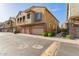 Beautiful townhome with brick accents, three car garage, and tasteful landscaping at 1350 S Greenfield Rd # 1040, Mesa, AZ 85206