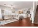 Cozy living area with open layout connecting to the kitchen and staircase at 1350 S Greenfield Rd # 1040, Mesa, AZ 85206