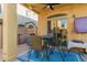 Covered patio features a ceiling fan, pavers and is ideal for relaxing outdoors at 1350 S Greenfield Rd # 1040, Mesa, AZ 85206