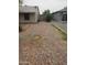 View of the backyard, featuring gravel and a block wall at 1363 E Clarendon Ave, Phoenix, AZ 85014