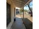 Covered porch with views of the street and neighborhood landscape at 1363 E Clarendon Ave, Phoenix, AZ 85014