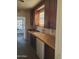 An older kitchen space with dated countertops and cabinetry at 1363 E Clarendon Ave, Phoenix, AZ 85014