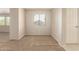 Large bedroom featuring neutral walls, plush carpet and a window at 14440 W Cholla St, Surprise, AZ 85379