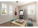 Cozy bedroom featuring neutral walls, shutters, and a playful arcade game and Monopoly set at 14440 W Cholla St, Surprise, AZ 85379