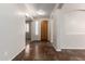 Inviting entryway with neutral walls, tiled floor, and ample natural light, leading to the rest of the home at 14440 W Cholla St, Surprise, AZ 85379