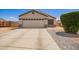Charming single-story home with a two-car garage and well-maintained landscaping in a quiet neighborhood at 14809 N El Frio Cir, El Mirage, AZ 85335