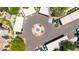 Aerial view of a beautiful roundabout with fountain and covered parking in an upscale community at 15151 N Frank Lloyd Wright Blvd # 1088, Scottsdale, AZ 85260