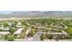 Great aerial view of gated community featuring mature landscaping and well-maintained desert landscaping at 15151 N Frank Lloyd Wright Blvd # 1088, Scottsdale, AZ 85260