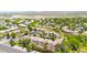 Beautiful aerial of gated community showcasing lush landscaping, mature trees, and community parking at 15151 N Frank Lloyd Wright Blvd # 1088, Scottsdale, AZ 85260