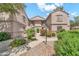 Inviting condo complex with lush landscaping and a well-maintained exterior at 15151 N Frank Lloyd Wright Blvd # 1088, Scottsdale, AZ 85260