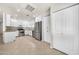 Bright kitchen features white cabinets, stainless steel appliances, and an island at 15151 N Frank Lloyd Wright Blvd # 1088, Scottsdale, AZ 85260