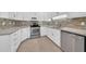 Bright kitchen featuring stainless steel appliances, modern countertops, decorative back splash, and tile flooring at 15151 N Frank Lloyd Wright Blvd # 1088, Scottsdale, AZ 85260