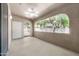 Covered patio with ceiling fan, open archway, and outdoor access for relaxing at 15151 N Frank Lloyd Wright Blvd # 1088, Scottsdale, AZ 85260