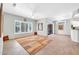 Inviting living room offering a spacious area with great light and neutral-colored walls and trim at 15161 W Cactus Ridge Way, Surprise, AZ 85374