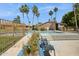 View of a community pool with lounge chairs and palm trees providing shade at 16276 E Rosetta Dr # 58, Fountain Hills, AZ 85268