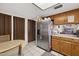 Efficient kitchen layout with good light and adjacent storage at 16276 E Rosetta Dr # 58, Fountain Hills, AZ 85268