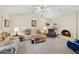 Bright living room featuring a fireplace and comfortable seating arrangement at 16276 E Rosetta Dr # 58, Fountain Hills, AZ 85268