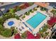 Aerial shot of community pool, hot tub, lounge seating, and landscaping at 16734 E Gunsight Dr # 109, Fountain Hills, AZ 85268
