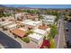 Overhead view of residential buildings with a community pool and manicured landscaping at 16734 E Gunsight Dr # 109, Fountain Hills, AZ 85268