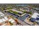 Scenic view of residential buildings, manicured landscape, parking areas, and a lake in the background at 16734 E Gunsight Dr # 109, Fountain Hills, AZ 85268