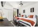Bedroom with twin beds, wood floors, closet doors, and window with a view at 16734 E Gunsight Dr # 109, Fountain Hills, AZ 85268