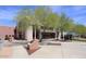 Fountain Hills Community Center surrounded by green landscaping, sidewalks and shade trees at 16734 E Gunsight Dr # 109, Fountain Hills, AZ 85268