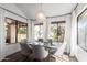 Bright dining area with modern decor, ample natural light, and comfortable seating, creating a welcoming ambiance at 16734 E Gunsight Dr # 109, Fountain Hills, AZ 85268