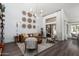 Bright living room featuring a high ceiling, modern lighting, and stylish decor at 16734 E Gunsight Dr # 109, Fountain Hills, AZ 85268