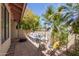 Inviting outdoor patio with comfortable seating, landscaping and sunshine at 16734 E Gunsight Dr # 109, Fountain Hills, AZ 85268