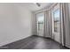 Bright bedroom features large windows with curtains, enhancing natural light and privacy at 1824 N Red Clf, Mesa, AZ 85207