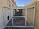Enclosed dog run offers a secure space for pets at 1824 N Red Clf, Mesa, AZ 85207