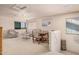 Bright living room with a fan, light colored walls, and neutral-toned furniture at 1902 S Rialto -- # Mesa, Mesa, AZ 85209