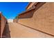 View of side yard with an exterior wall and a shed at 1902 S Rialto -- # Mesa, Mesa, AZ 85209