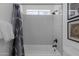 Bathroom showing subway tile surround and oil rubbed bronze fixtures at 19601 N 7Th St # 2095, Phoenix, AZ 85024