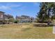 Scenic view of community homes surrounding a large grassy field, promoting a sense of community at 19601 N 7Th St # 2095, Phoenix, AZ 85024
