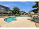 Inviting community pool area with lounge chairs under a clear sky surrounded by well-maintained landscaping at 19601 N 7Th St # 2095, Phoenix, AZ 85024