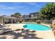 Relaxing community pool area with plenty of sunshine, featuring lounge chairs, and lush greenery at 19601 N 7Th St # 2095, Phoenix, AZ 85024