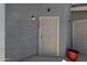 Close-up of the building's front door, with a secure screen door and visible unit number at 19601 N 7Th St # 2095, Phoenix, AZ 85024