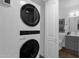 Space-saving stackable washer/dryer adjacent to the bathroom for added convenience at 19601 N 7Th St # 2095, Phoenix, AZ 85024