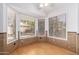 Charming breakfast nook area with a cozy tiled base and bright windows bringing in plenty of natural light at 2244 E Rawhide St, Gilbert, AZ 85296