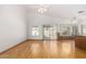 Bright living room features sleek hardwood floors and access to the backyard at 2244 E Rawhide St, Gilbert, AZ 85296