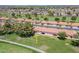 Aerial view shows proximity to golf course and neighborhood amenities at 2311 S Farnsworth Dr # 81, Mesa, AZ 85209