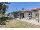 An inviting back patio with dining table and chairs, perfect for outdoor entertaining at 2311 S Farnsworth Dr # 81, Mesa, AZ 85209