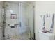 Updated bathroom featuring tiled shower with a glass door at 2311 S Farnsworth Dr # 81, Mesa, AZ 85209