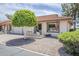 Charming single-story home featuring a desert landscape, front patio, and a well-maintained exterior at 2311 S Farnsworth Dr # 81, Mesa, AZ 85209