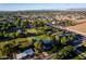 Scenic aerial view showing the neighborhood, lush greenery, residential homes, and nearby community landmarks at 2350 E Melrose St, Gilbert, AZ 85297
